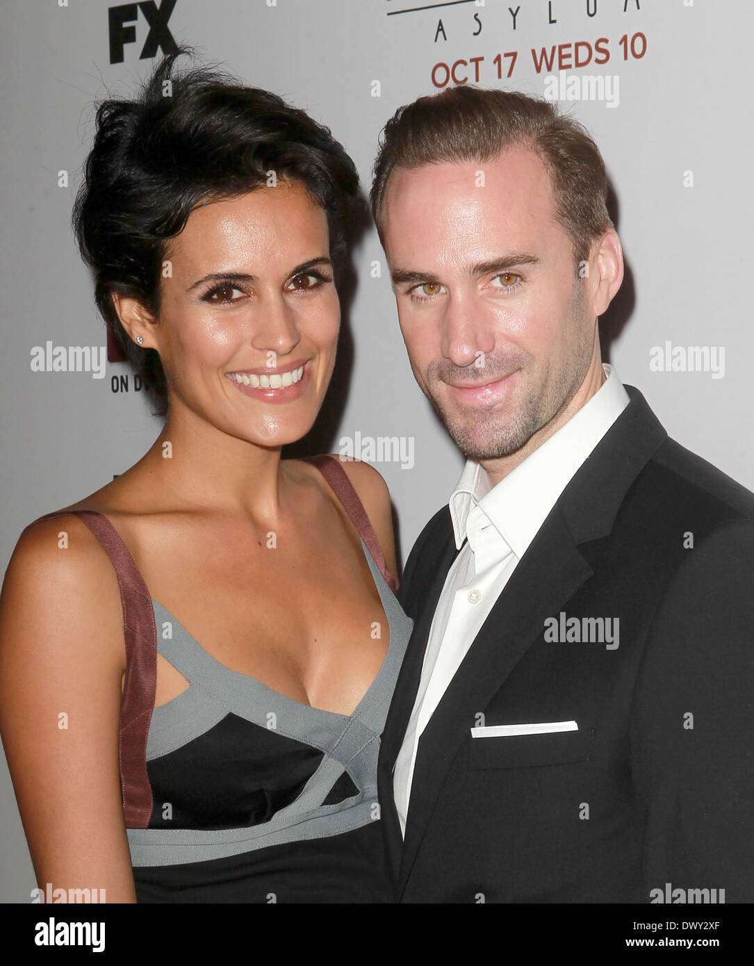 Joseph Fiennes; Maria Dolores Dieguez Premiere Screening of FX's 'American Horror Story: Asylum' at the Paramount Theatre Hollywood, California - 13.10.12 Featuring: Joseph Fiennes; Maria Dolores Dieguez Where: Hollywood, California, United States When: 1 Stock Photo