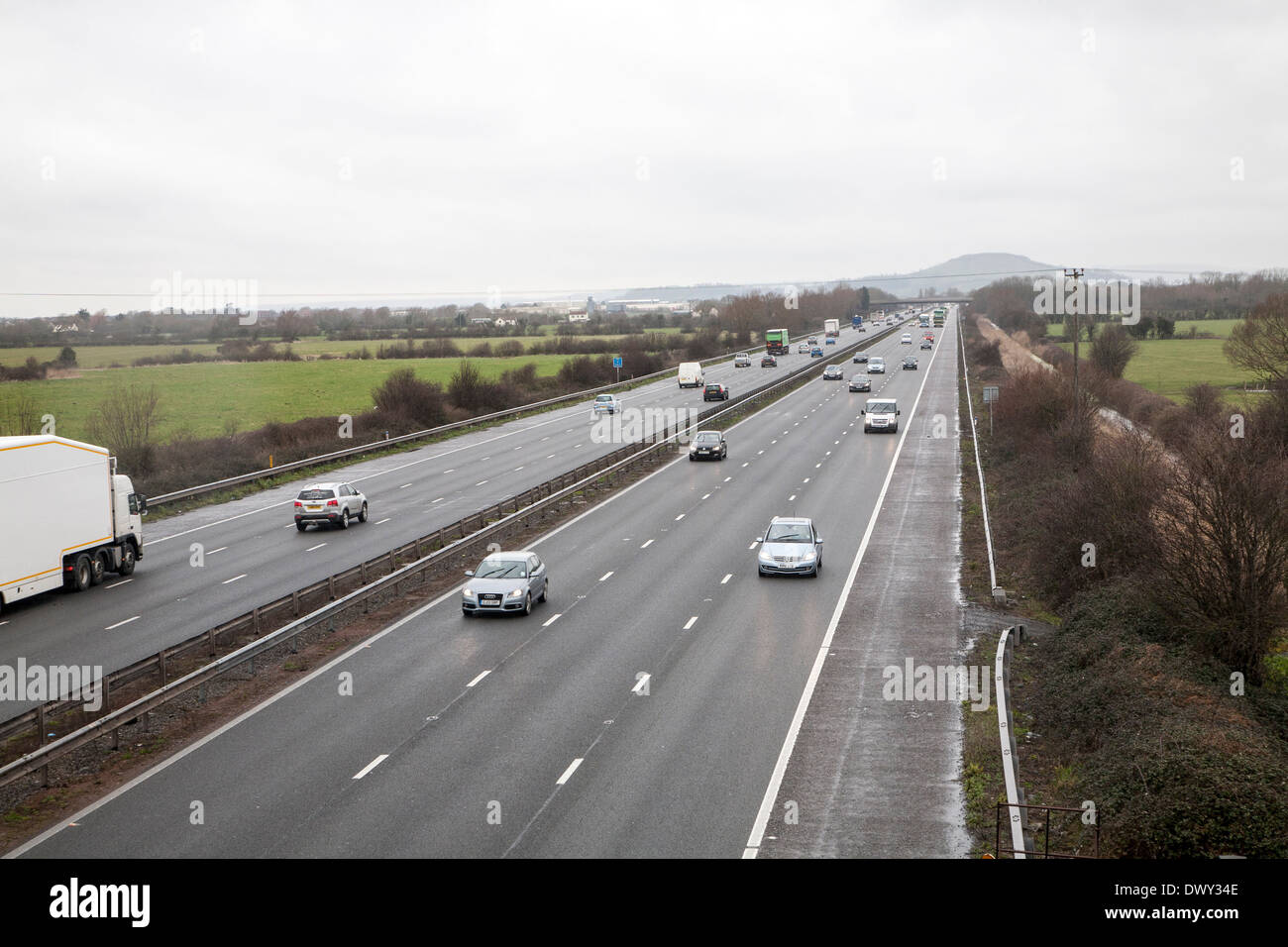Traffic driving in winter on the M5 motorway near Bridgwater, Somerset, England looking north Stock Photo