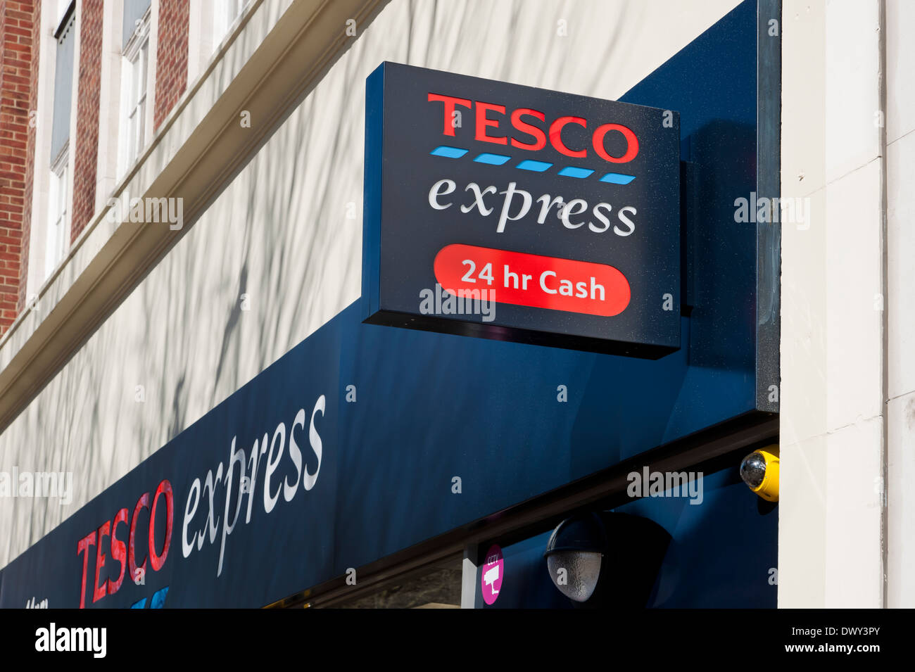 Close up of Tesco Express supermarket sign convenience shop store stores signage exterior Hull East Yorkshire England UK United Kingdom Great Britain Stock Photo