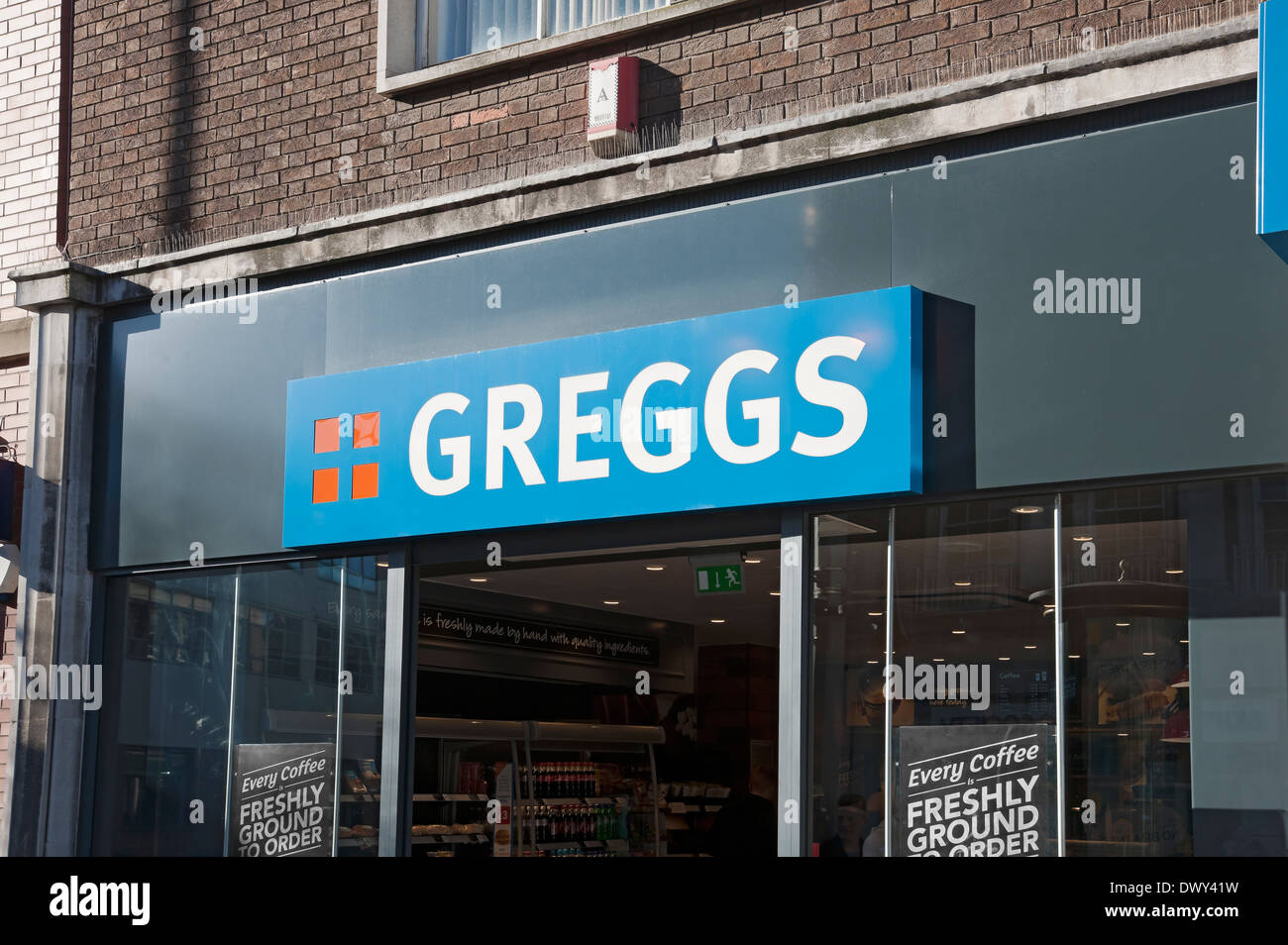 Close up of Greggs the baker bakery sign signage convenience food shop store stores Hull East Yorkshire England UK United Kingdom GB Great Britain Stock Photo