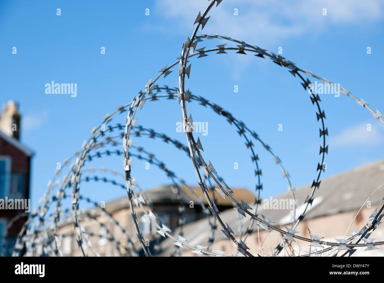 Close up of barbed wire razorwire security fence jail prision Hull East Yorkshire England UK United Kingdom GB Great Britain Stock Photo