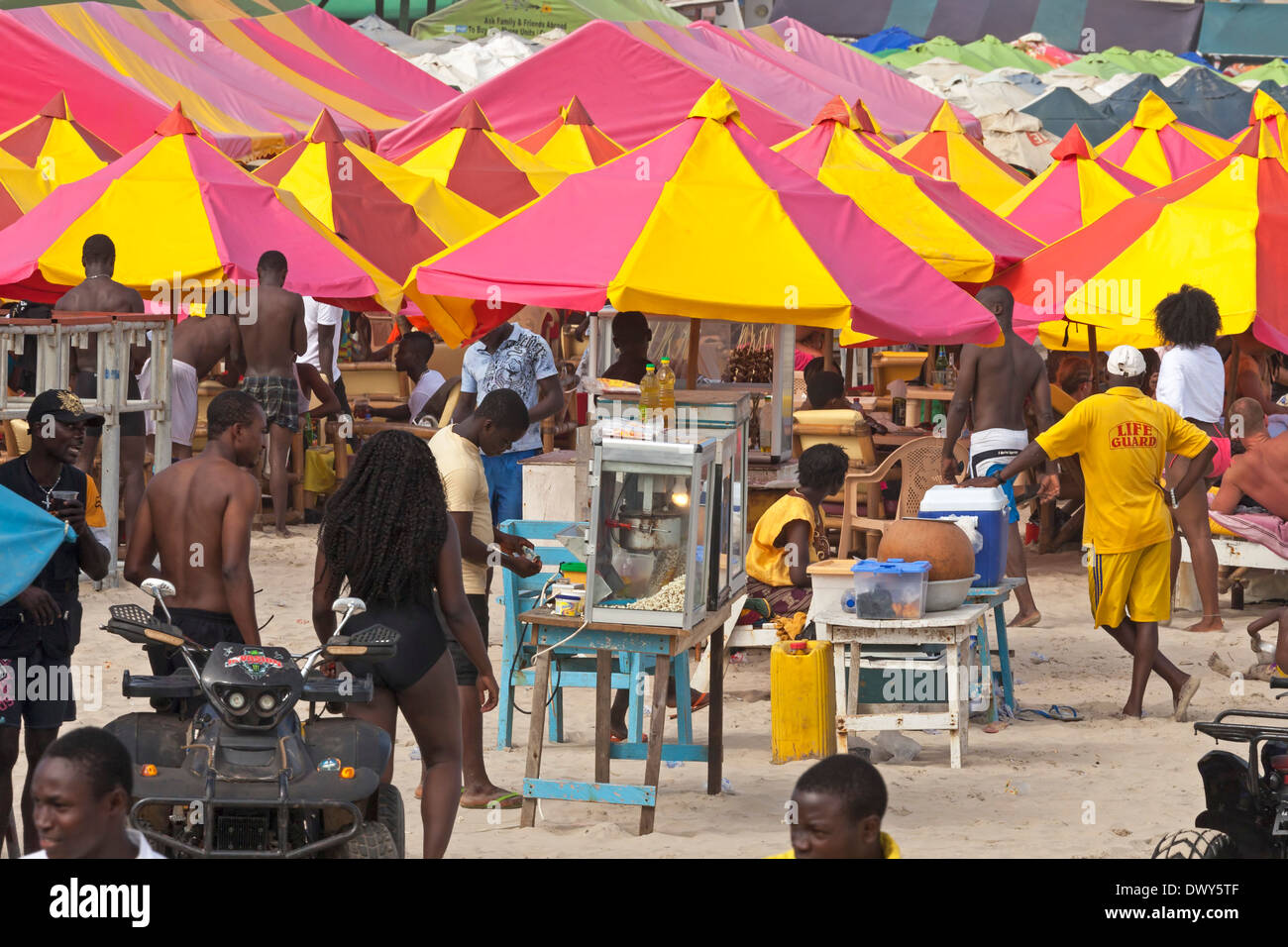 Umbrellas on Labadi beach, Accra, Ghana, Africa Stock Photo