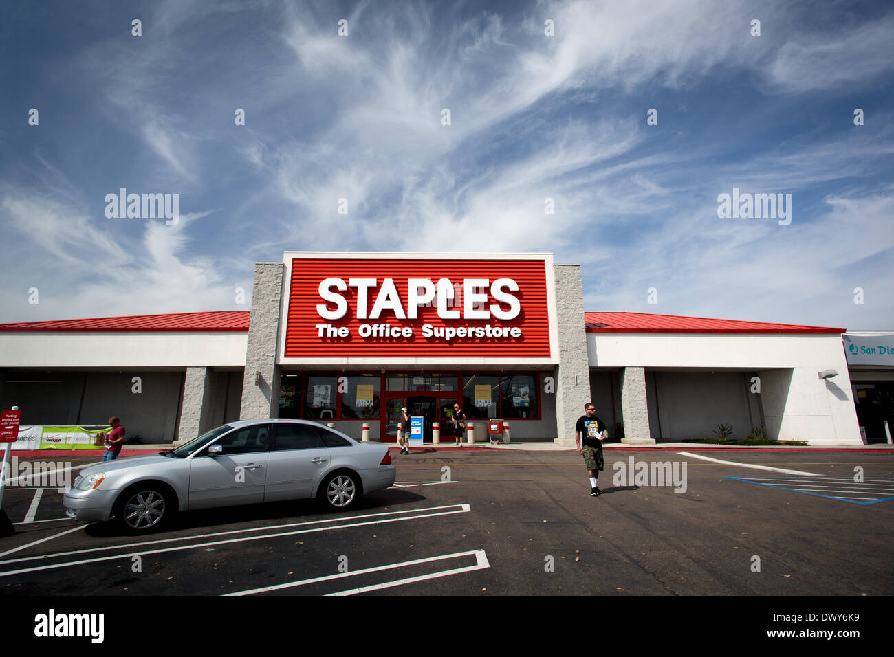 Shoppers leaving a Staples in San Diego, March 2014. Staples, Inc. is a large office supply chain store. Stock Photo