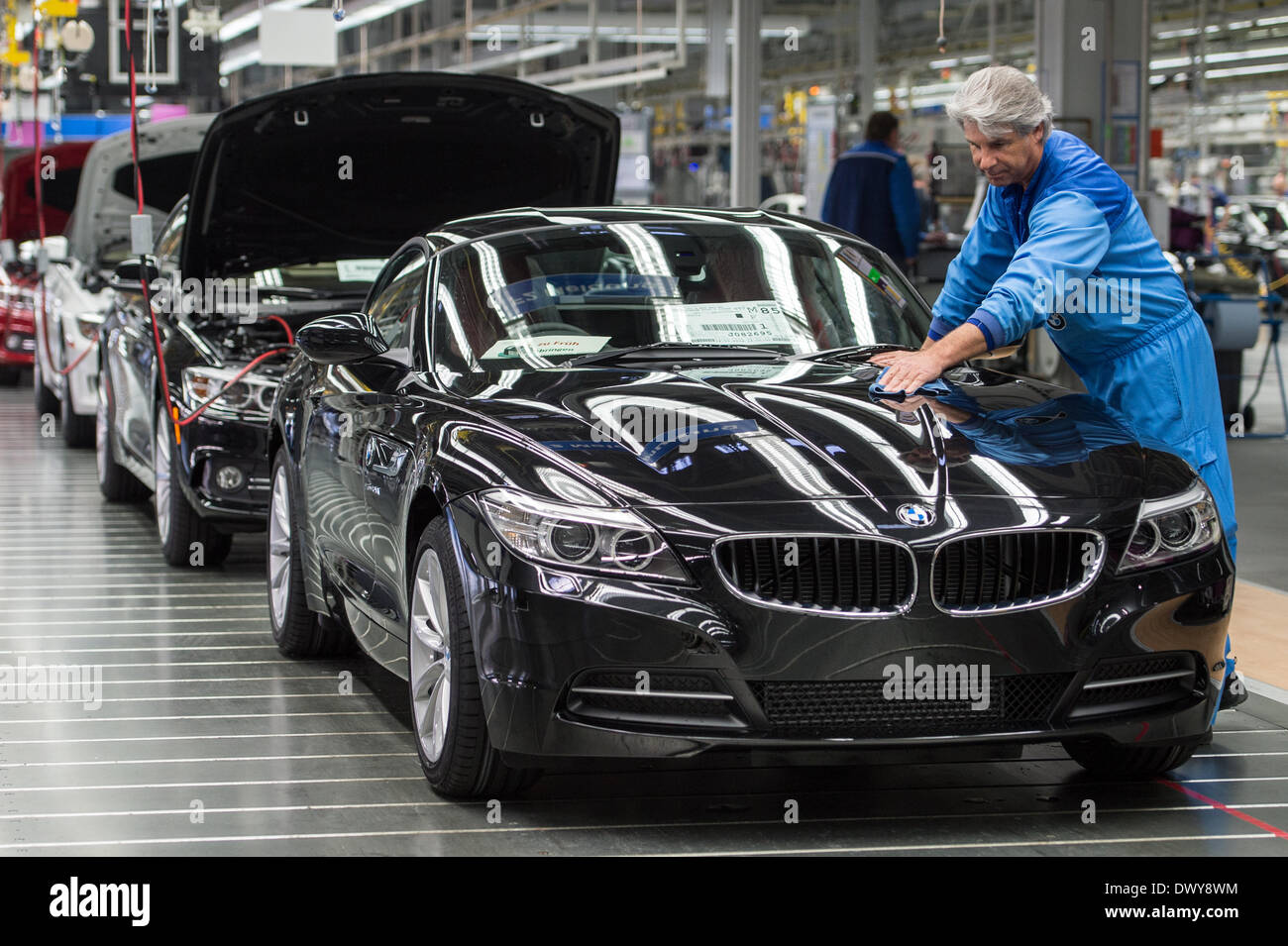 Regensburg, Germany. 13th Mar, 2014. A worker conducts a final