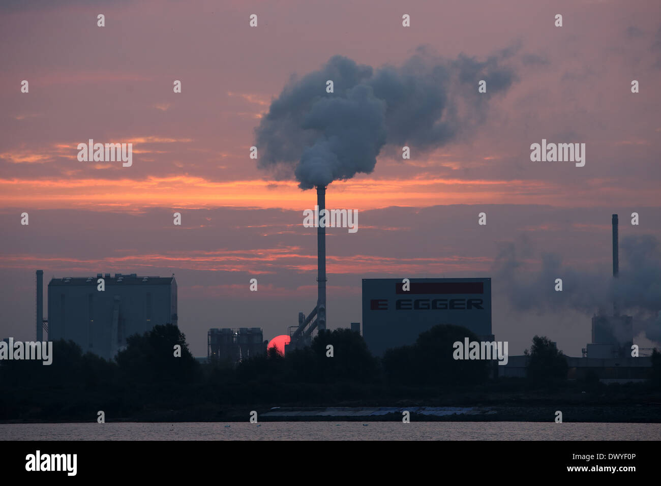 Wismar, Germany, fuming industrial chimney system Klausner Nordic Timber Stock Photo