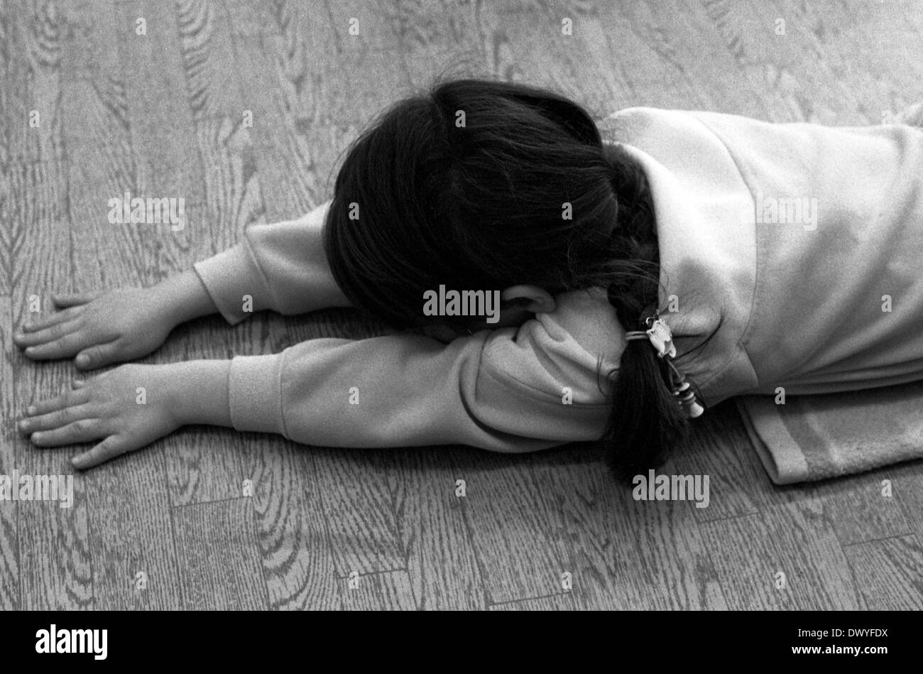 Berlin, GDR, girl doing yoga in a kindergarten Stock Photo