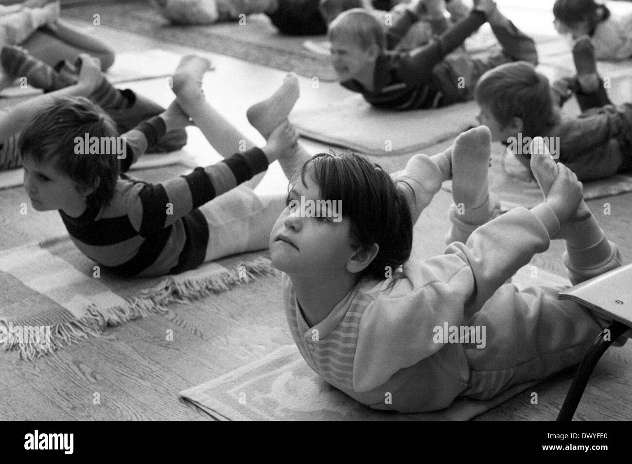 Berlin, GDR, children do yoga in a kindergarten Stock Photo