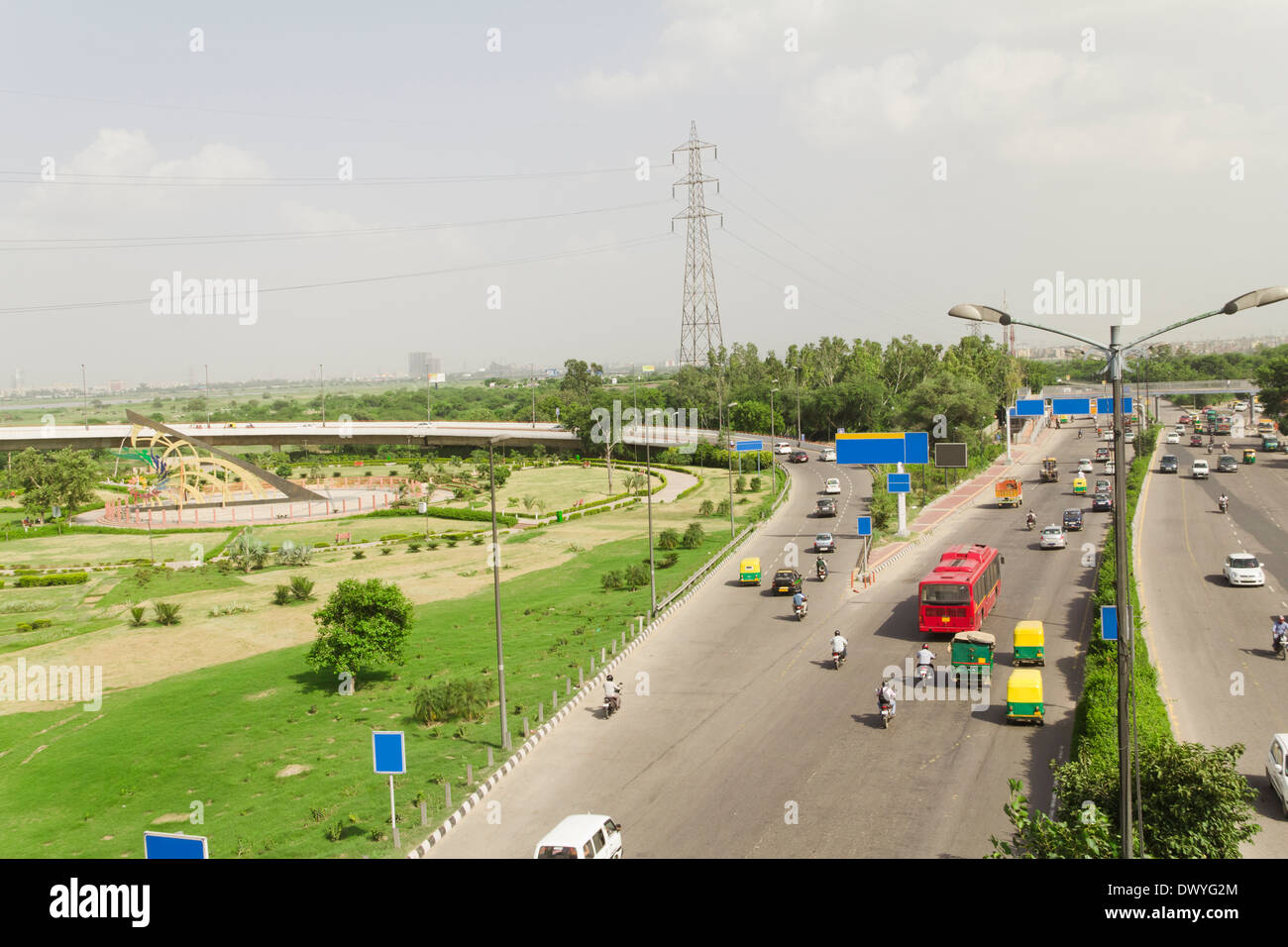 Indian Traffic on Road, Traffic on Highway, Elevated view of traffic, Traffic. Road side, Car, Auto, Bike, Transportations, Stock Photo