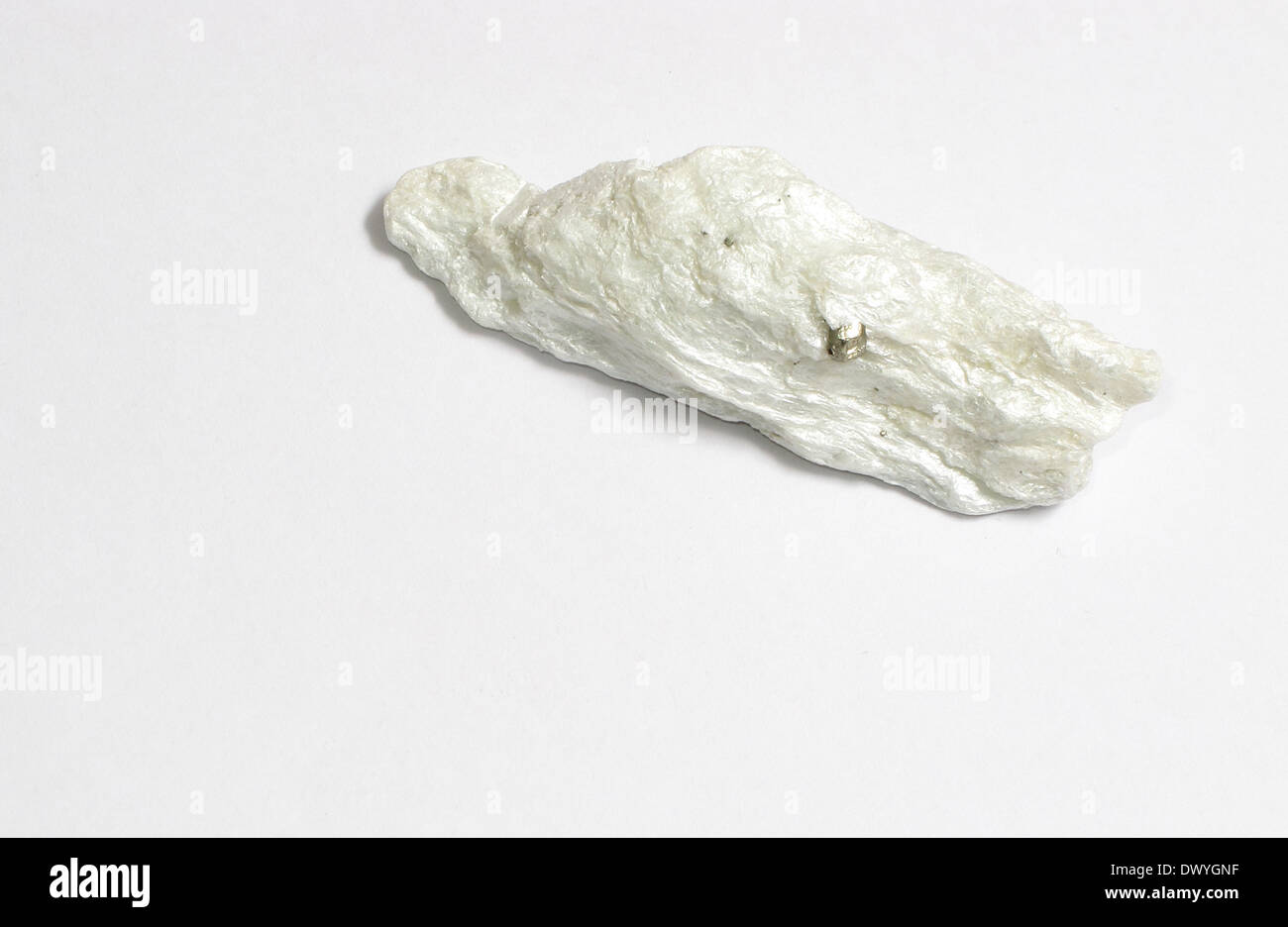 An image showing a small piece of the hydrated magnesium silicate