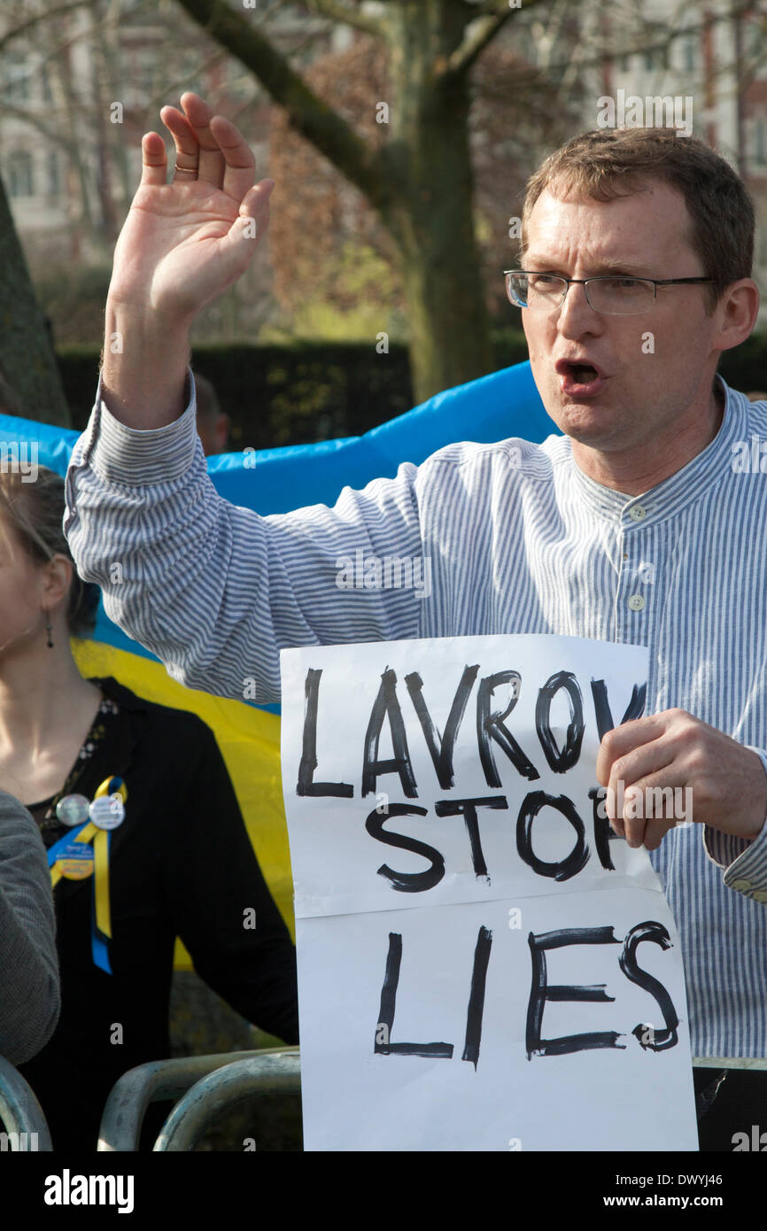 London UK. 14th March 2014. A Ukranian protester outside the American Ambassador residence in London against the visit of  Russian foreign minister Sergei Lavrov who was meeting US Secretary of State John Kerry  to discuss the Ukranian crisis and the referendum in Crimea which ended in a stalemate Stock Photo