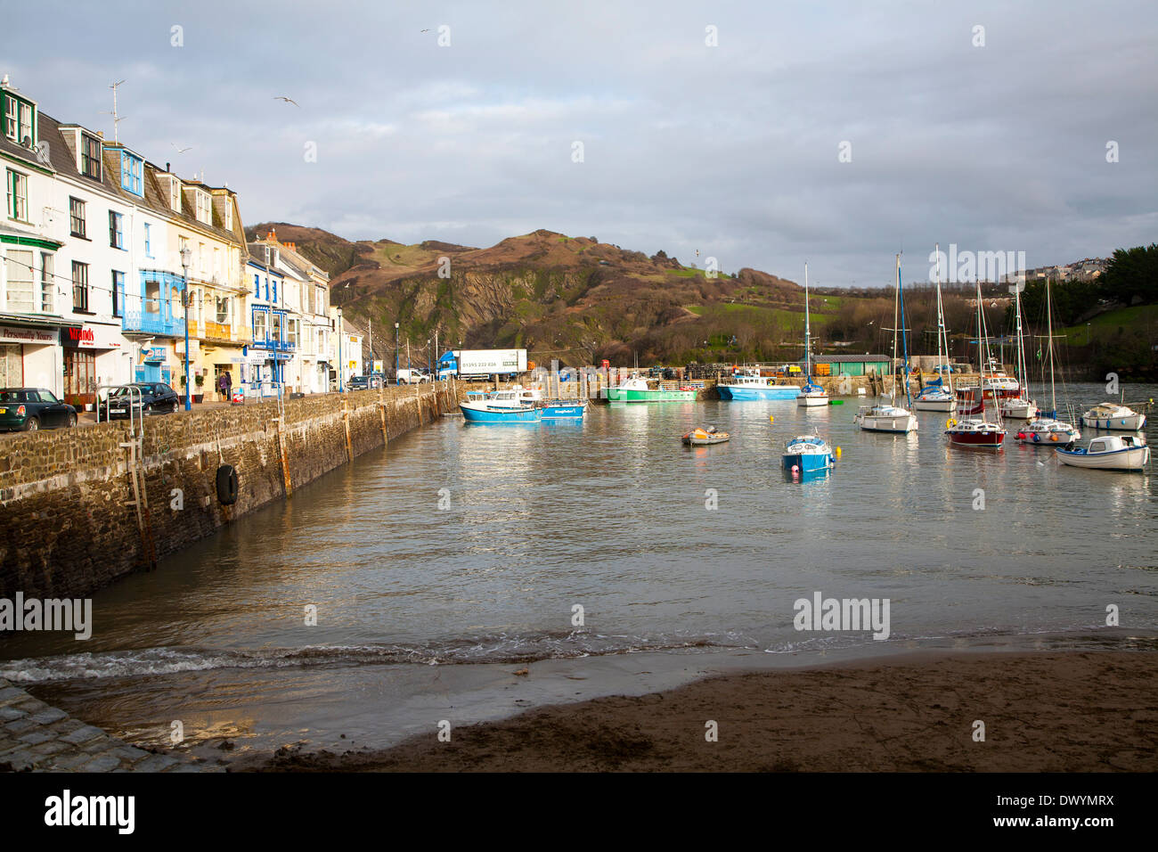 View of boats in the harbour in sunshine of winter afternoon, Ilfracombe, north Devon, England Stock Photo
