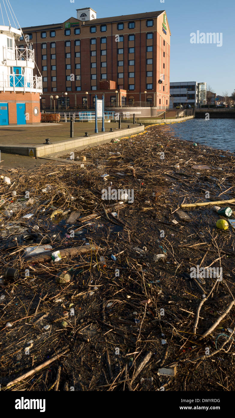 Holiday Inn Express at Welland Lock, Salford Quays, Manchester, England, UK.  With a lot of floating debris in the foreground. Stock Photo