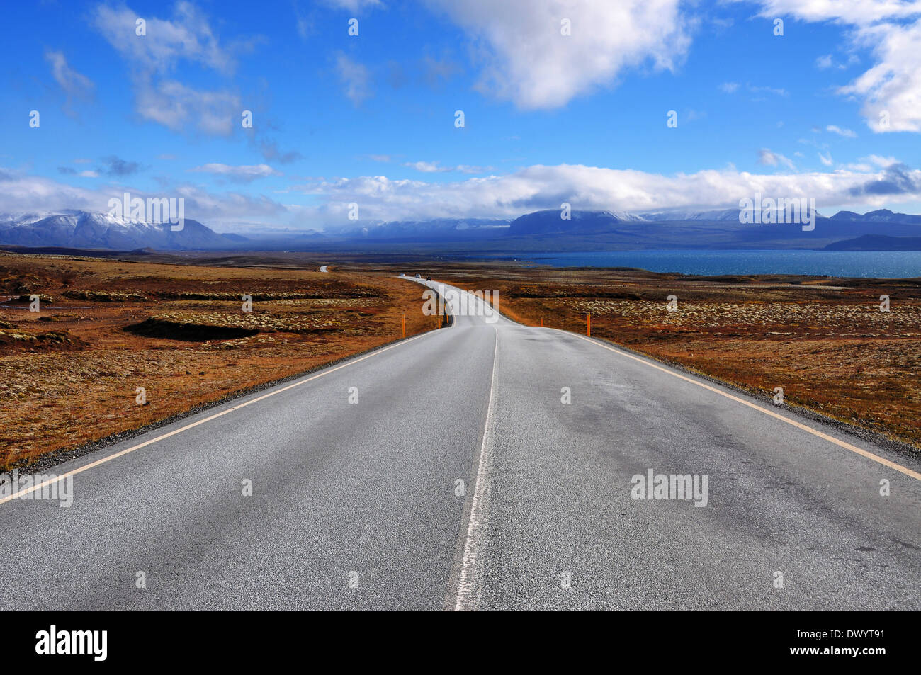 Long and empty asphalt road in Iceland Stock Photo