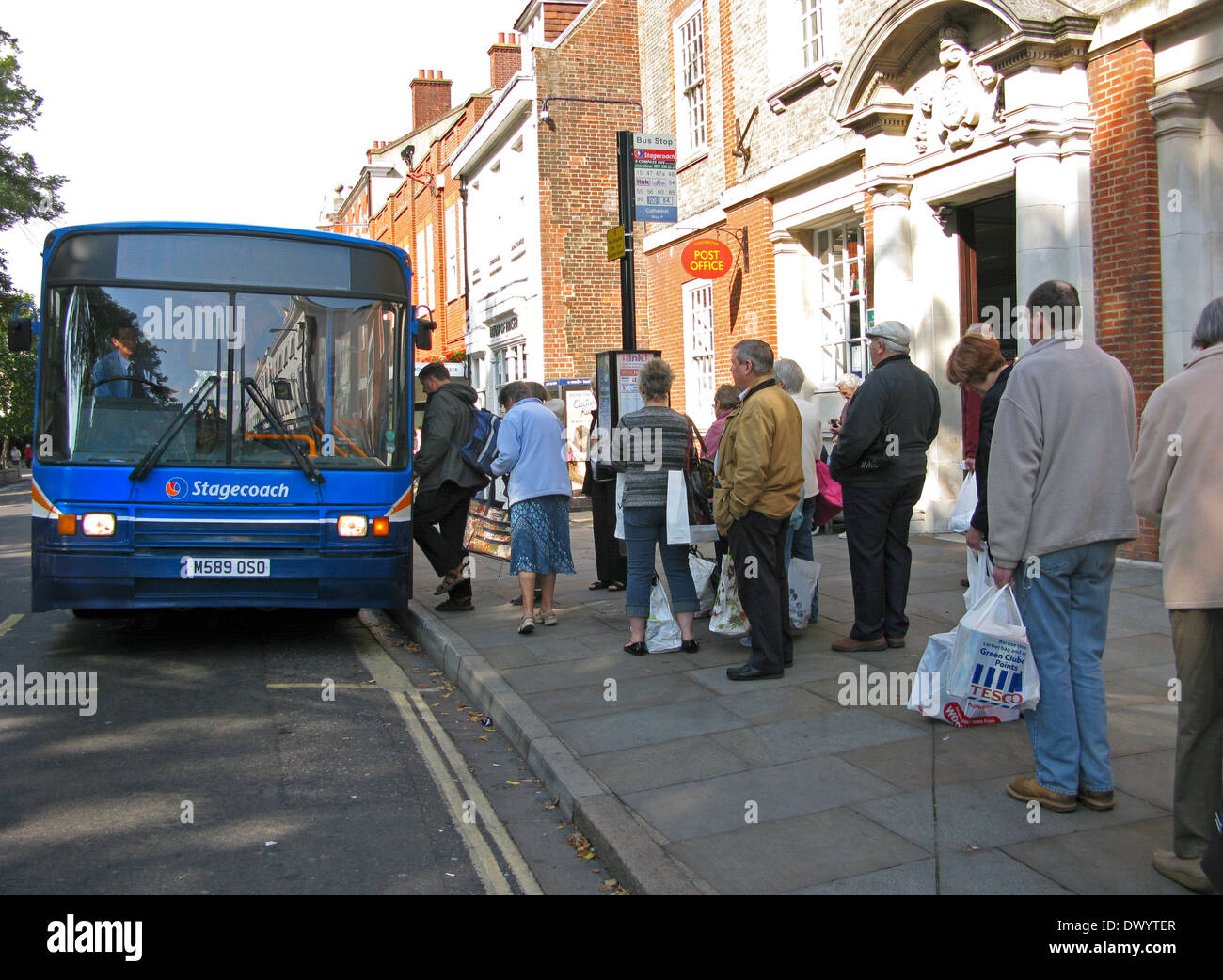 People queueing & boarding a Stagecoach bus in Chichester West Sussex UK Stock Photo