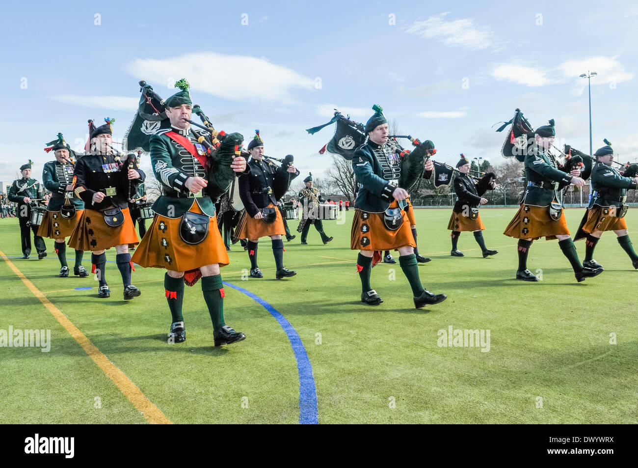 Lisburn, Northern Ireland. 15 Mar 2014 - The band of the Royal Irish Regiment march at the Shamrock Presentation and Drumhead Service in Thiepval Barracks. Credit:  Stephen Barnes/Alamy Live News Stock Photo