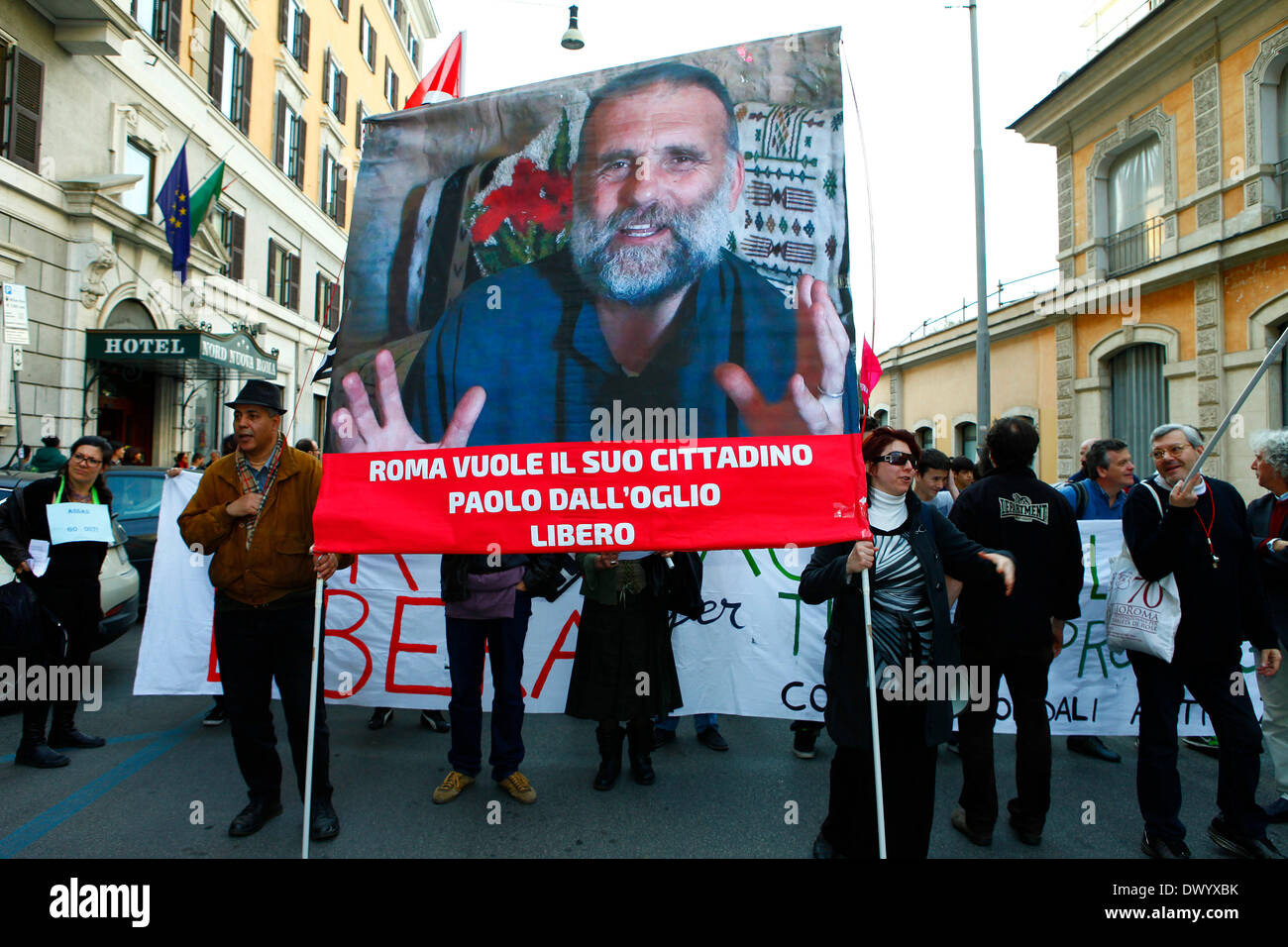 A banner to support the liberation of Father Paolo Dall'Oglio, italian priest kidnapped in Syria during a demo for peace Stock Photo