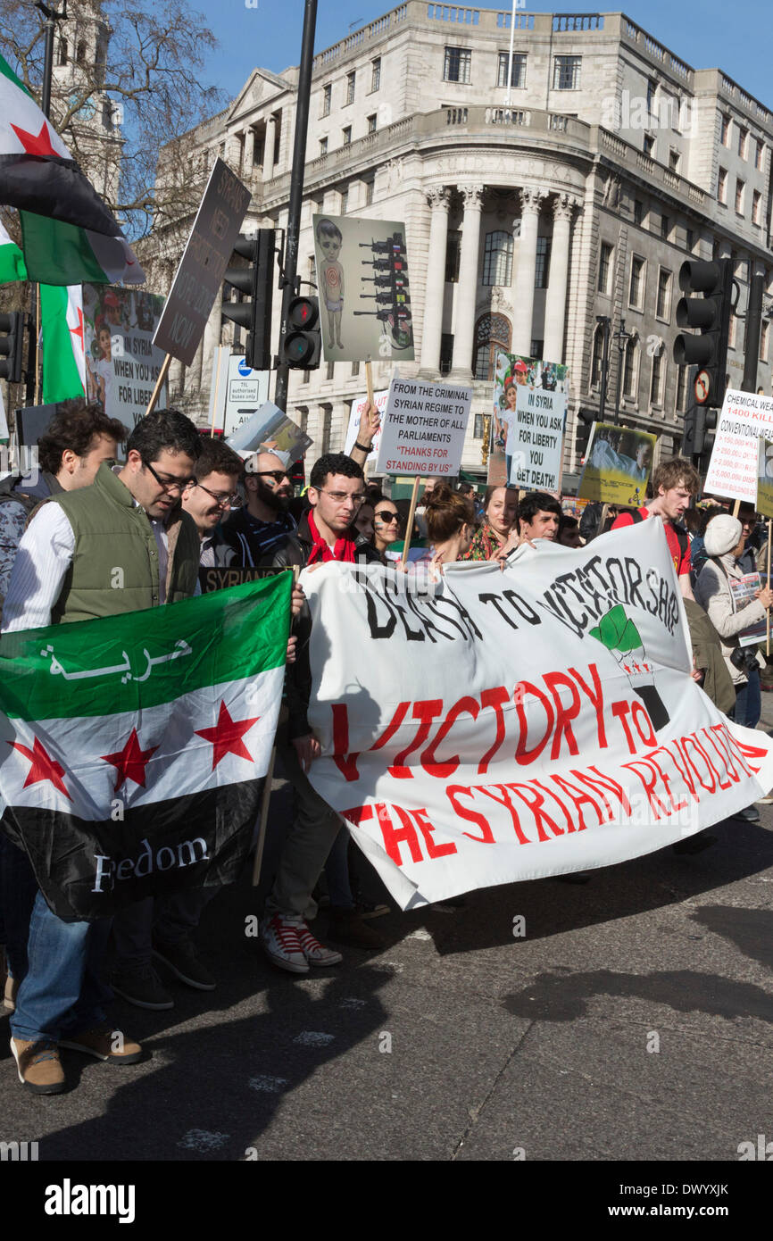 London, UK. 15 March 2014. A march against Assad's regime and the killing of citizens in Syria takes place in Central London. Credit:  Nick Savage/Alamy Live News Stock Photo