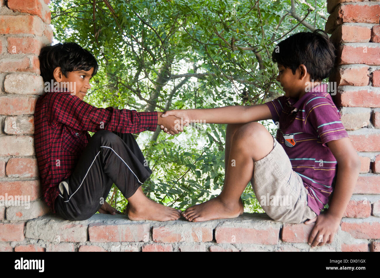 Indian Rural Kids Sitting at Home Stock Photo