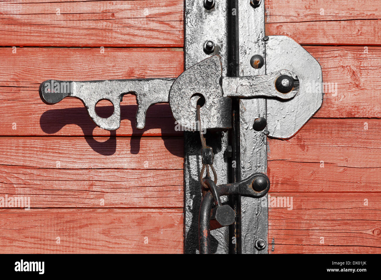 Closeup of a vintage wooden latch on a building Stock Photo