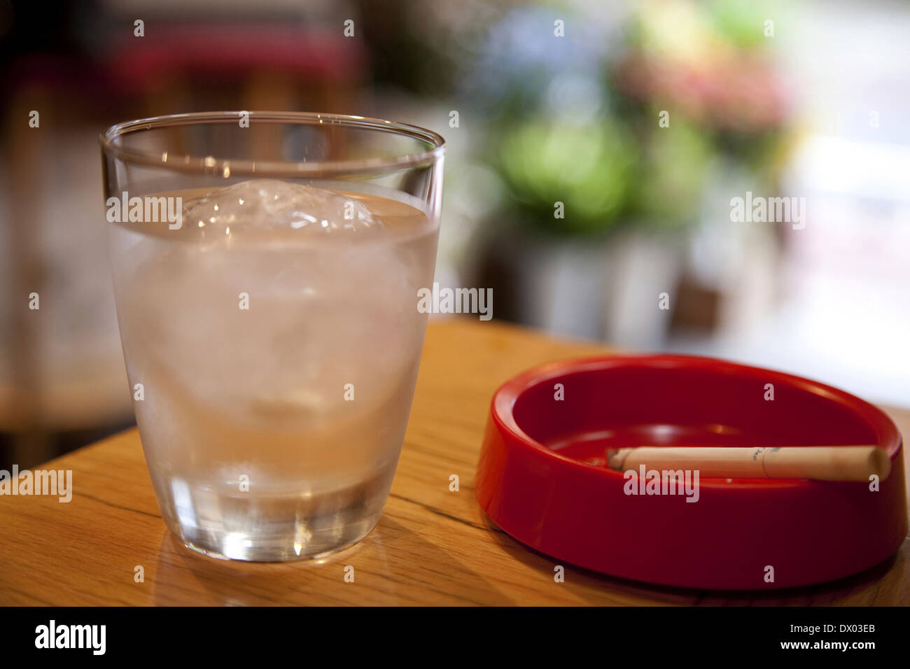 Glass of water and ashtray Stock Photo Alamy