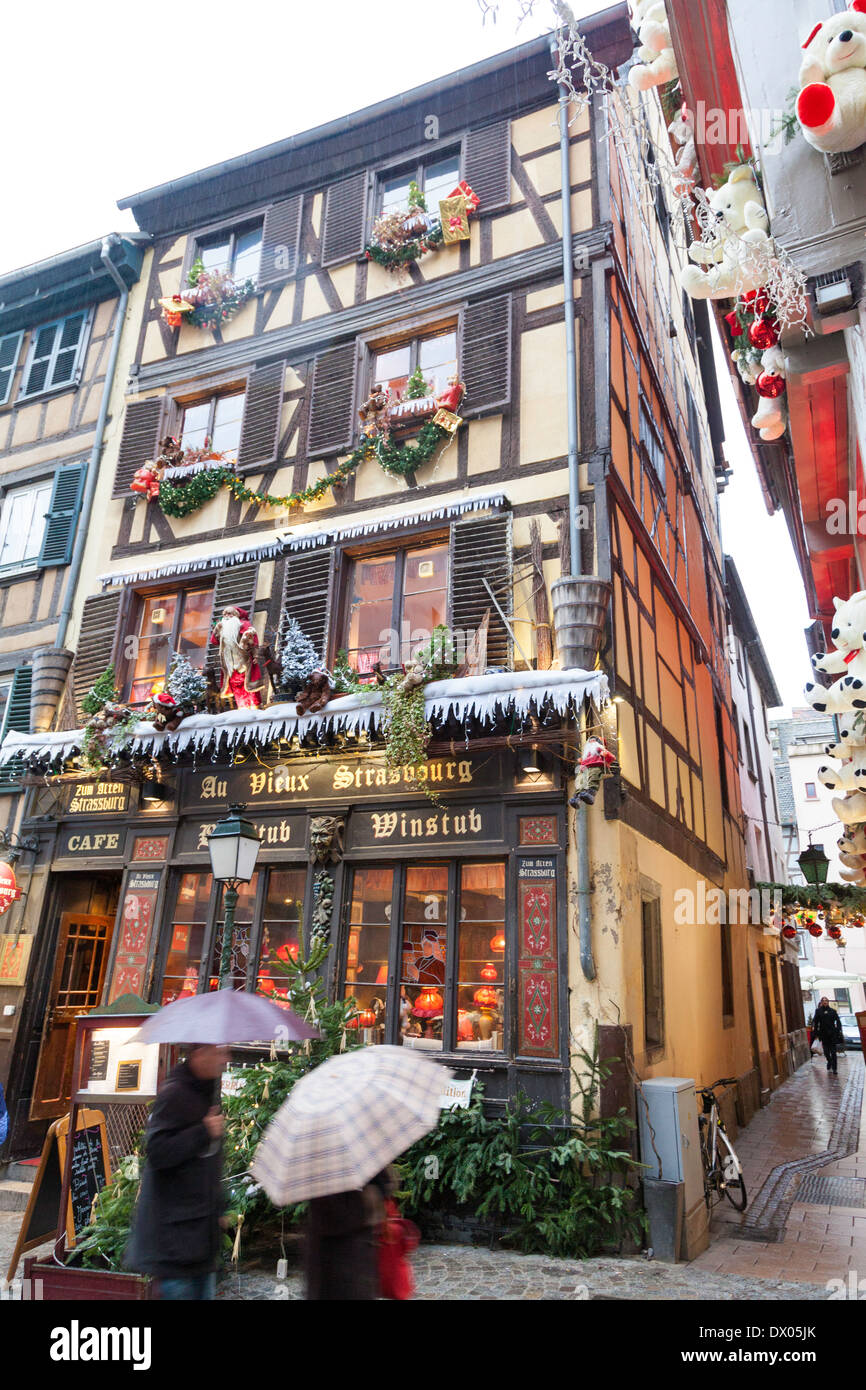 Christmas decorations on the exterior of a traditional winebar in Strasbourg, France Stock Photo