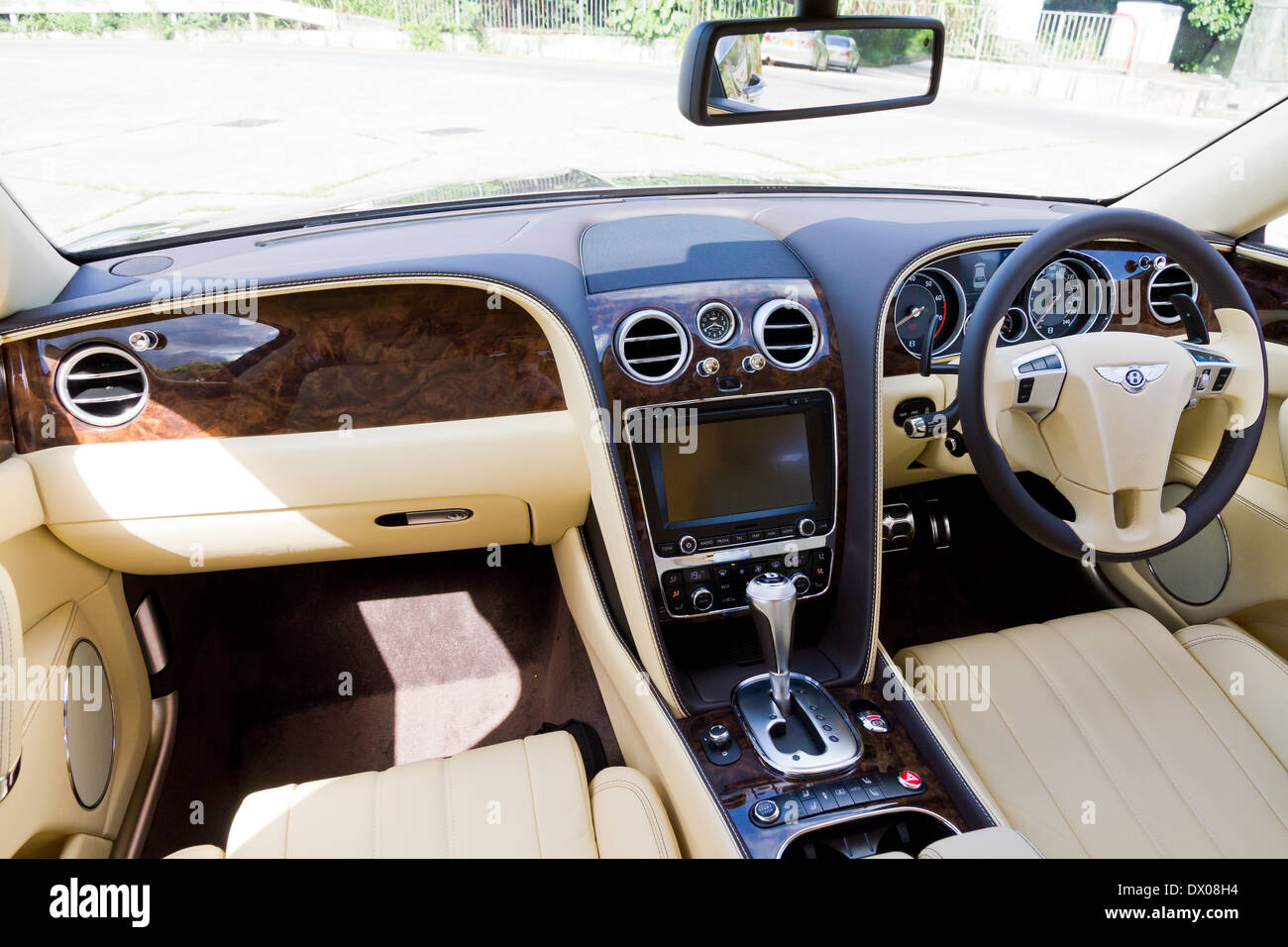 Bentley The New Flying Spur 2013 Model with Golden Brown Color Stock Photo