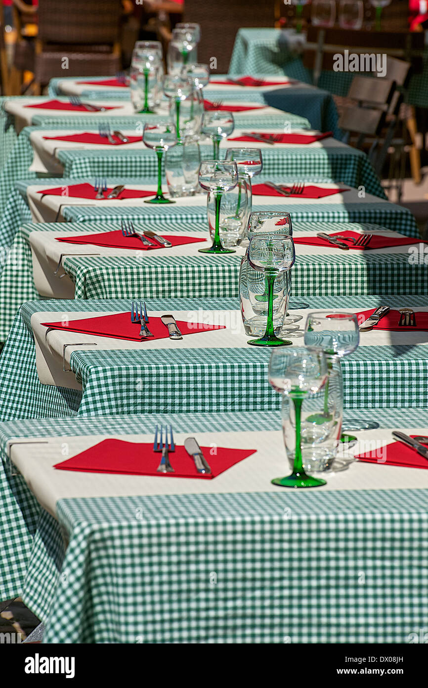 Cutlery prepared on Tables at a restaurant Stock Photo