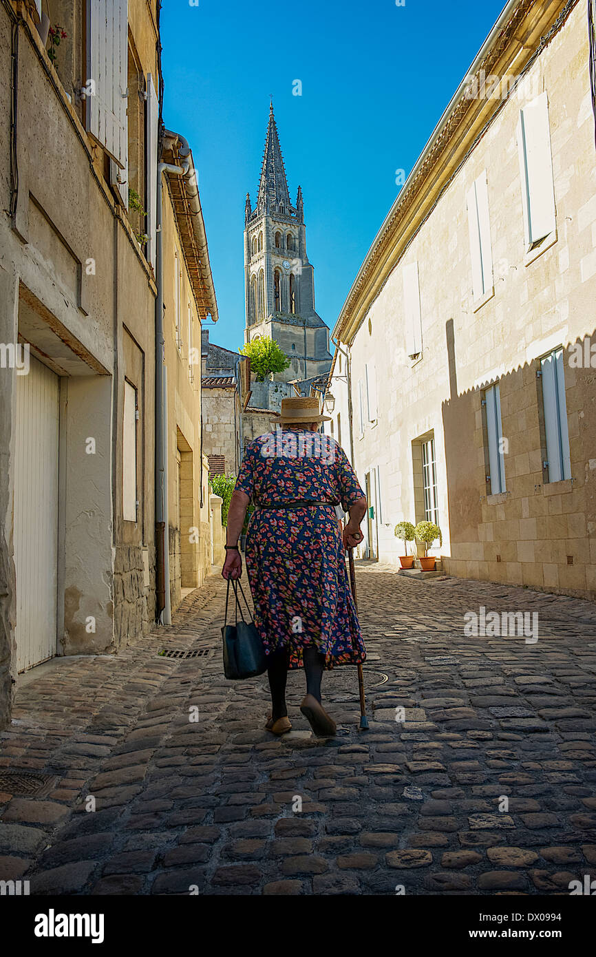 Old woman walking stick hi-res stock photography and images - Alamy