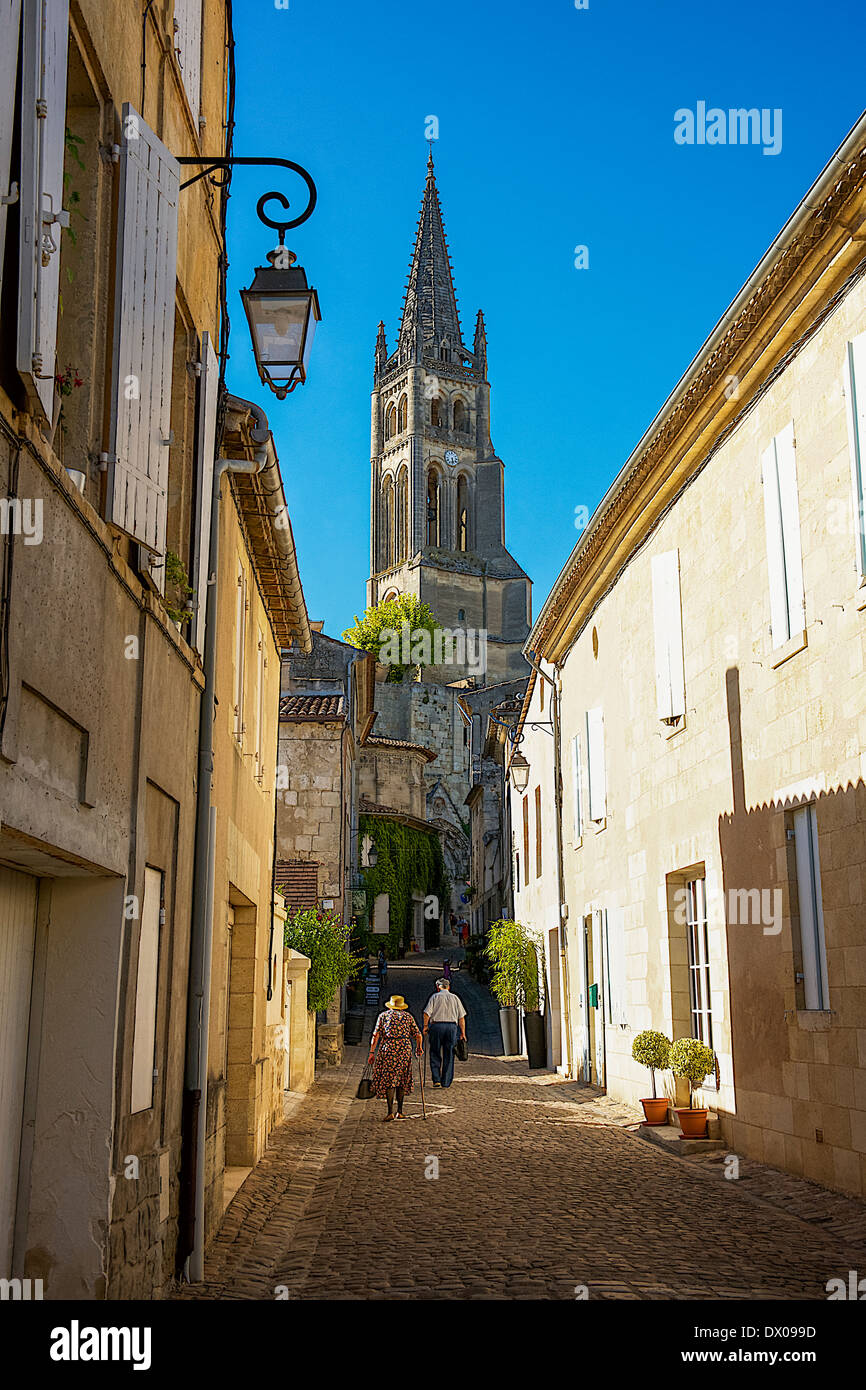 Old people walking on a street in Saint-Emilion, France Stock Photo