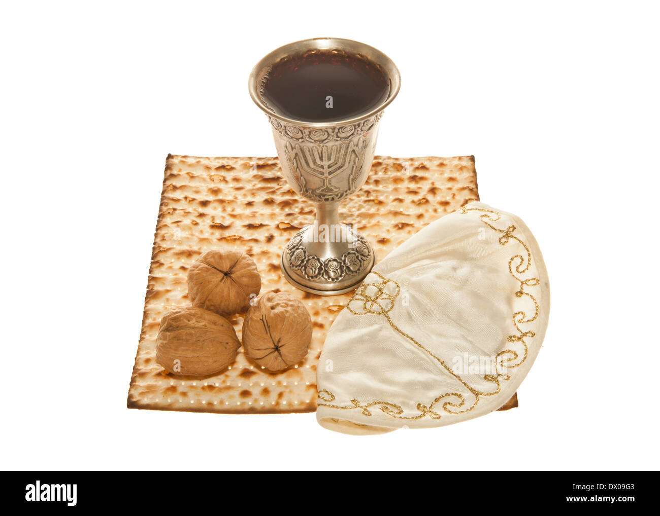 Matzoth, silver Kiddush cup and walnuts for Passover seder Stock Photo