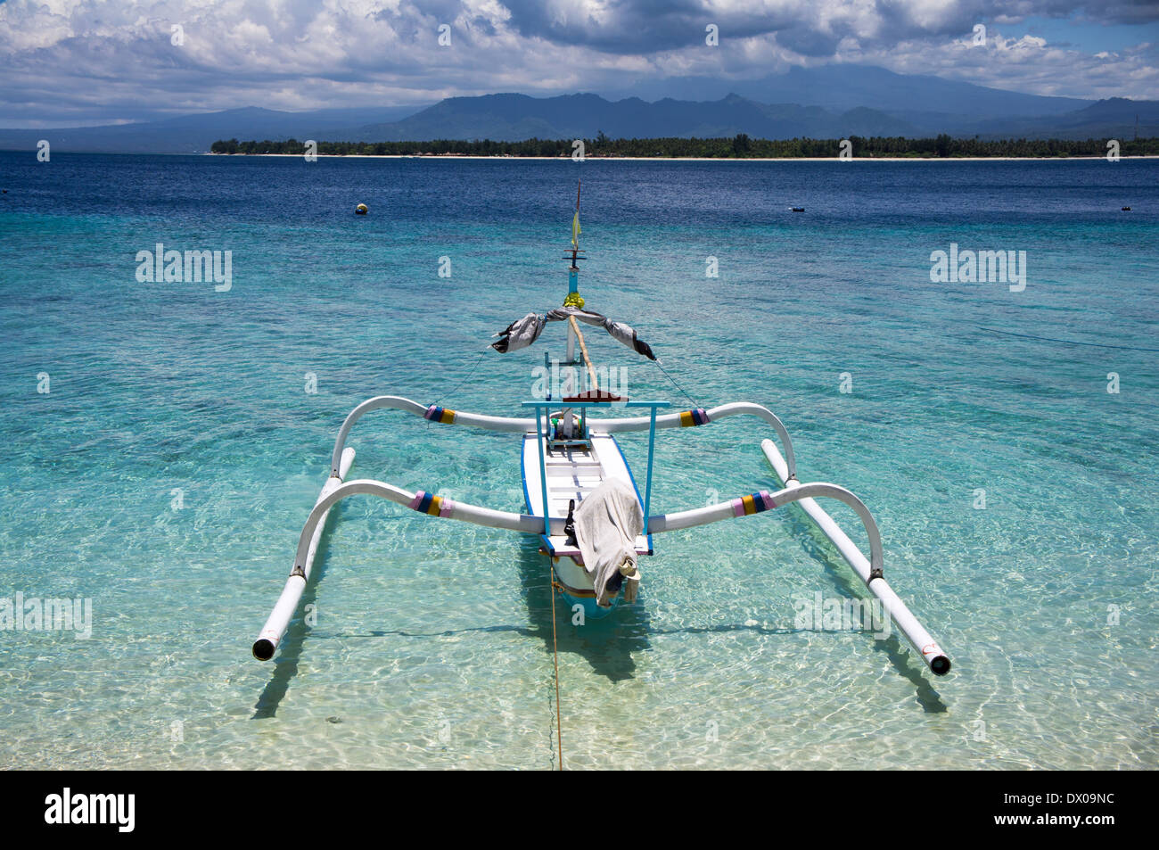 Traditional wooden fishing boat on the shore. Gili islands, Indonesia Stock Photo
