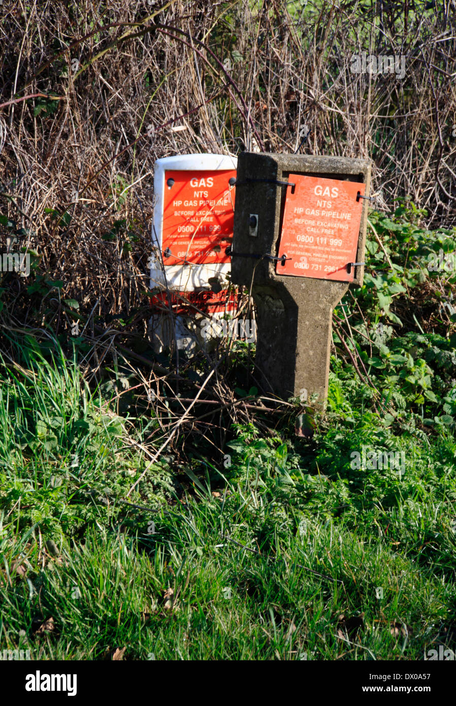 High Pressure gas pipeline marker posts by the roadside at Bintree