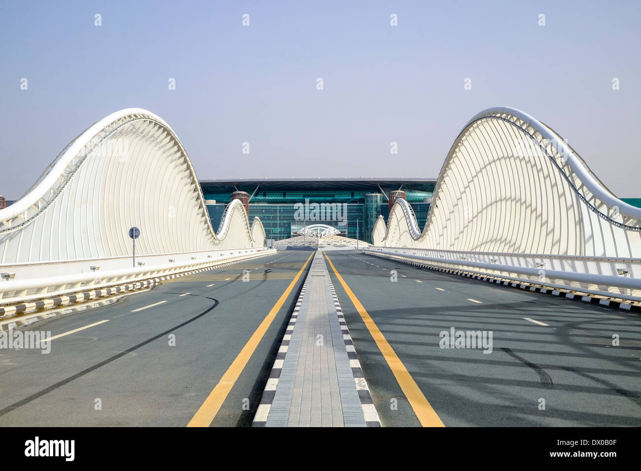 Modern highway bridge at approach to Al Meydan racecourse in Dubai United Arab Emirates Stock Photo