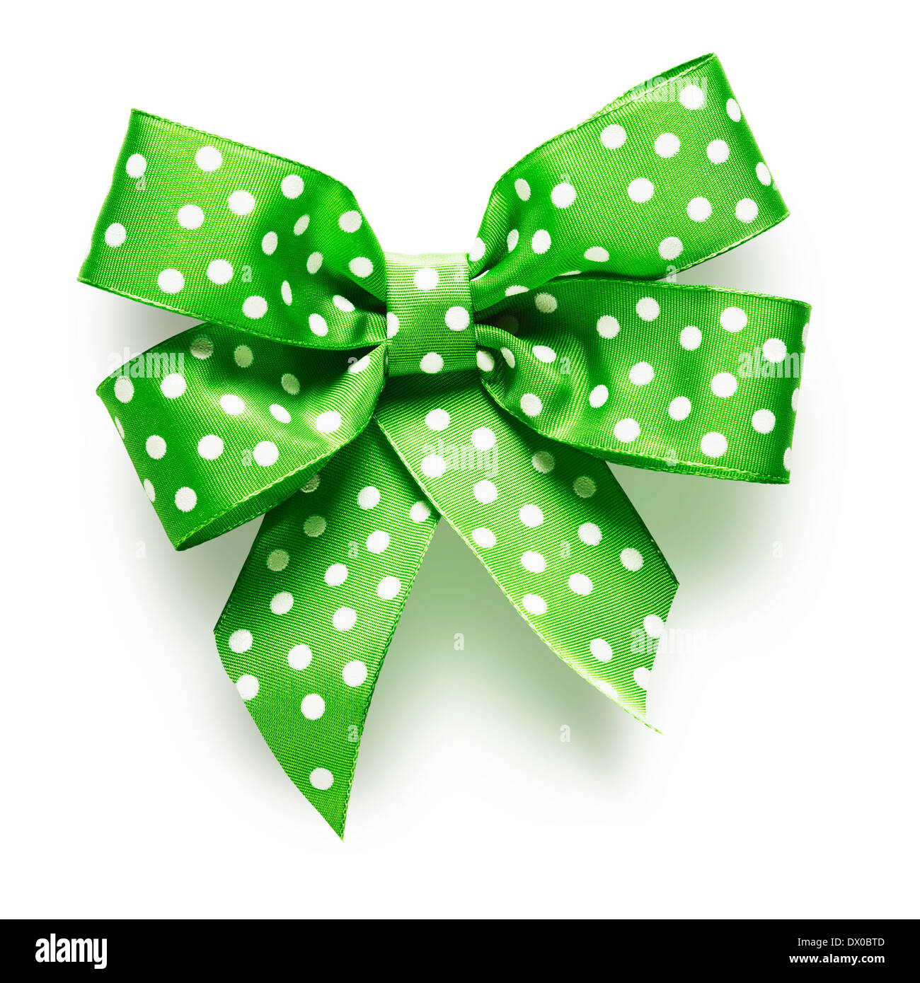 Polka dot green ribbon bow on white background clipping path included Stock Photo