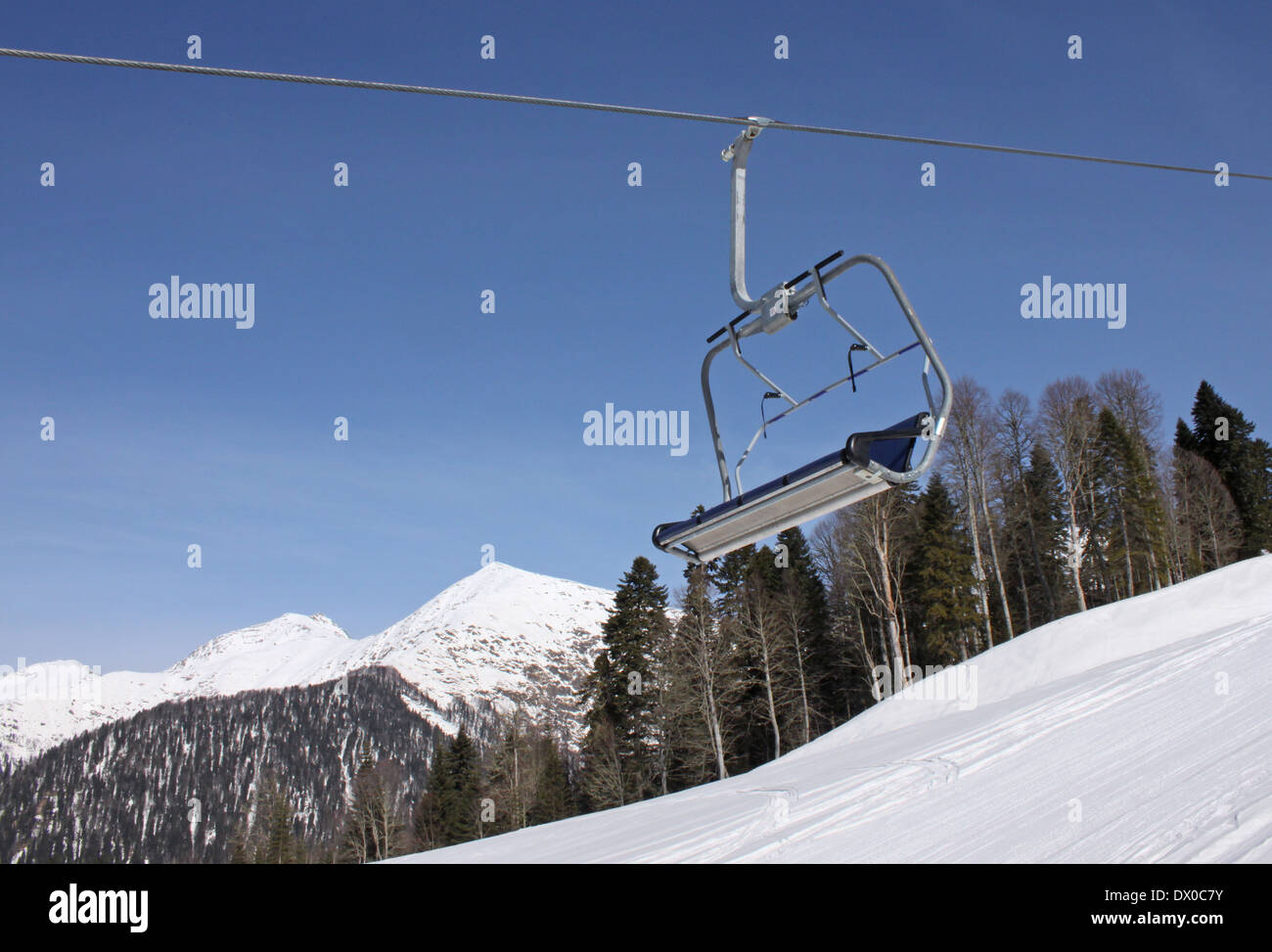 chairlift in Caucasian mountains at winter Stock Photo