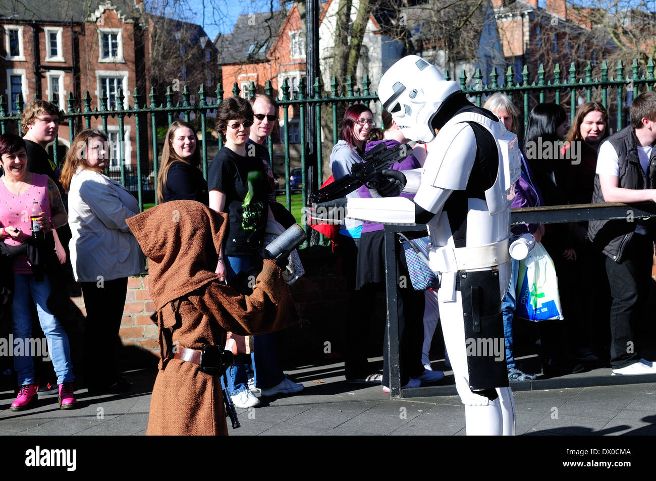 Nottingham, UK. 16th Mar, 2014. Hundreds of Sci-Fi fans descended on Nottingham's Albert Hall for first ever EM-CON convention .Guest included Craig Charles, Ben Miller, Danny John-Jules, and a host of other stars.Jawa and stormtrooper from Star Wars go head to haed . Credit:  Ian Francis/Alamy Live News Stock Photo