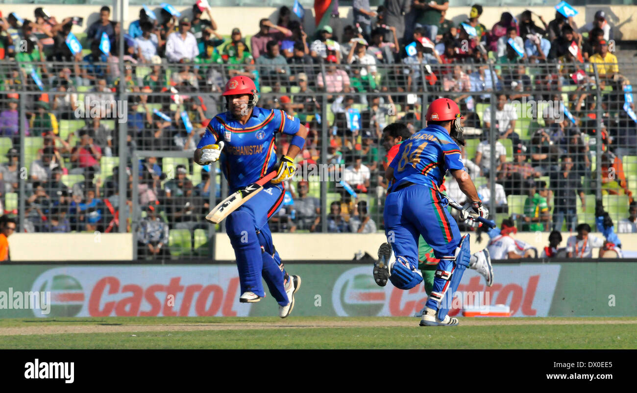 Dhaka, Bangladesh. 16th Mar, 2014. Players of Afghanistan compete during the International Cricket Council (ICC) Twenty 20 World Cup opening match against Bangladesh at Sher-e-Bangla Stadium in Dhaka, Bangladesh, March 16, 2014. Credit:  Shariful Islam/Xinhua/Alamy Live News Stock Photo