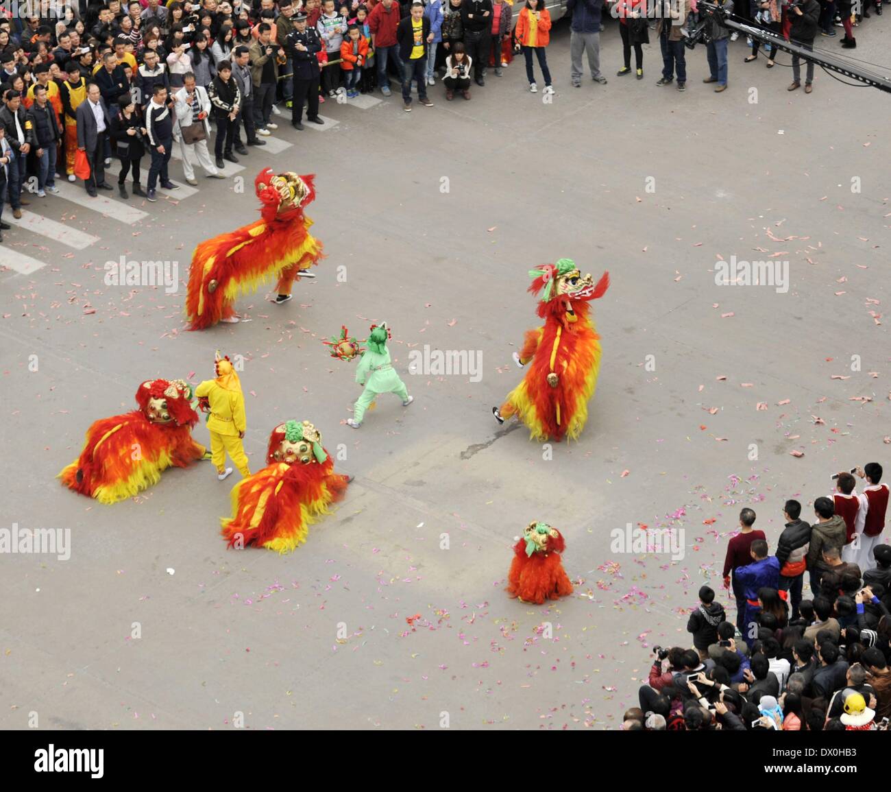 Shantou, China's Guangdong Province. 16th Mar, 2014. People play lion dance during an 'animal' parade celebrating their Ximen neighborhood committee's anniversary of establishment at Chenghai District in Shantou City, south China's Guangdong Province, March 16, 2014. Credit:  Wang Yusheng/Xinhua/Alamy Live News Stock Photo