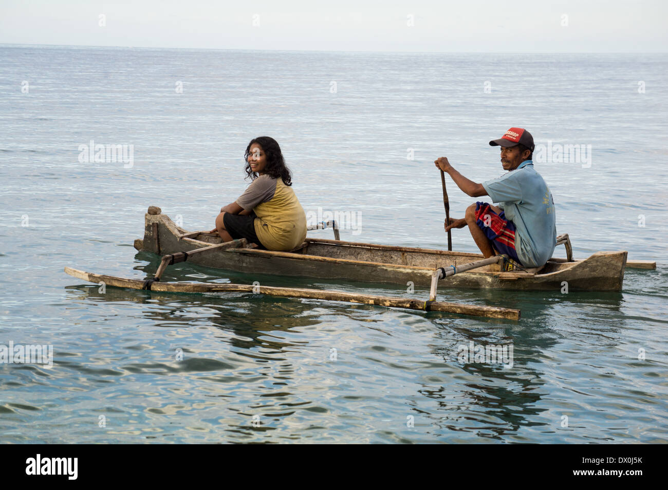local people on a small boat, Indonesia Stock Photo