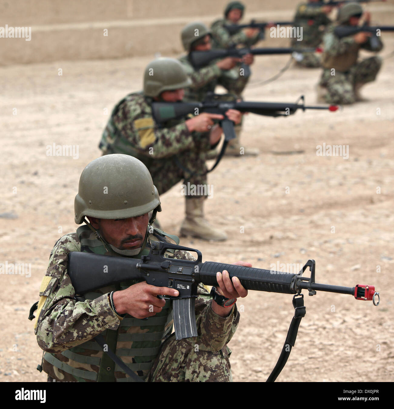 Afghan National Army soldiers with the 215th Corps, during rifleman's course at Camp Bastion March 8, 2014 near Lashkar Gah, Afghanistan. Stock Photo