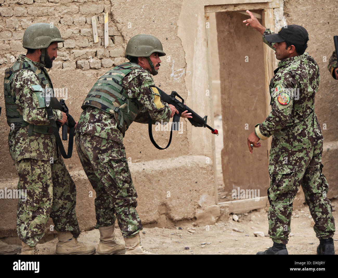 Afghan National Army soldiers with the 215th Corps, during rifleman's course at Camp Bastion March 8, 2014 near Lashkar Gah, Afghanistan. Stock Photo