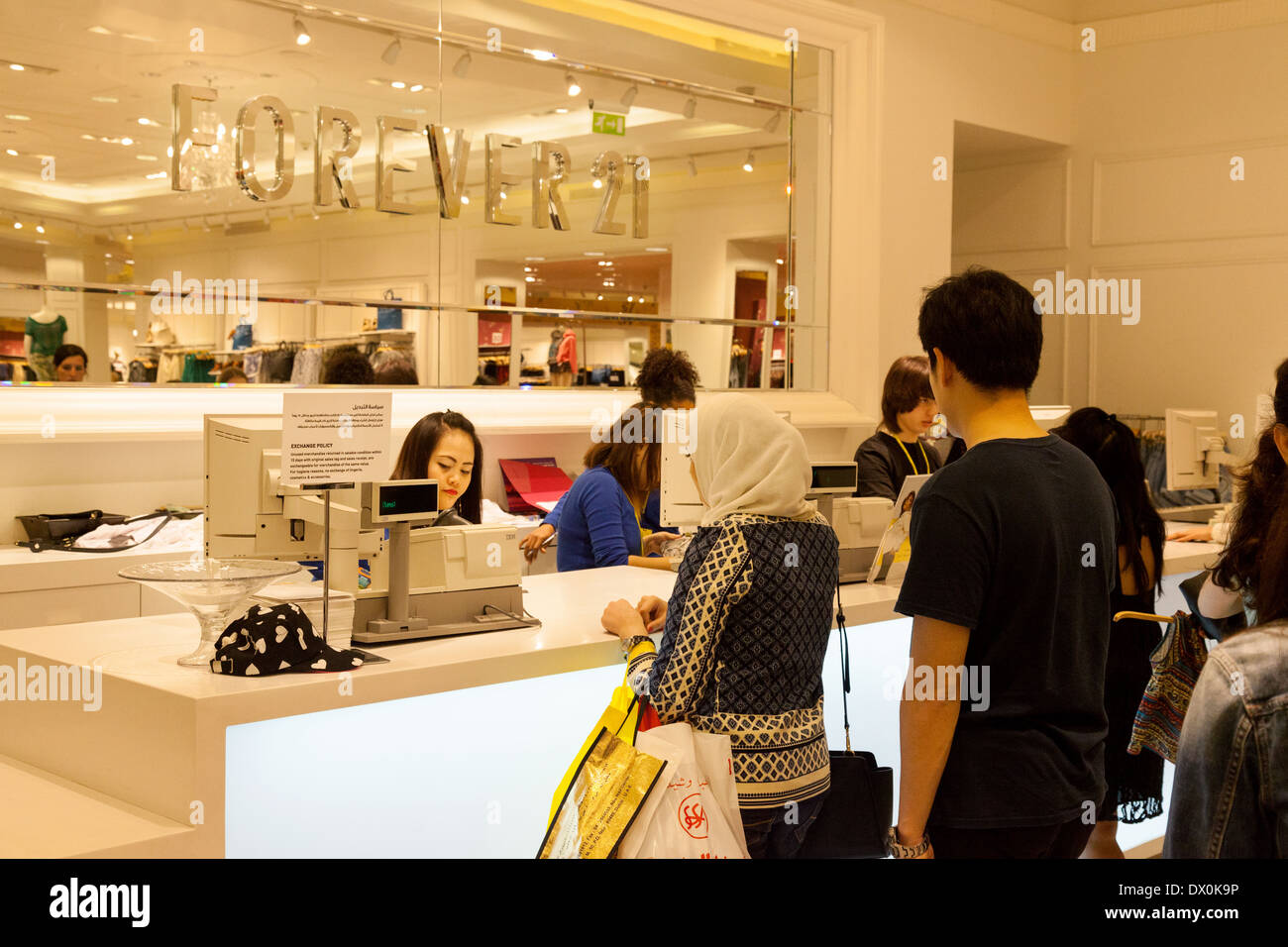 People shopping at the cash till, buying clothes, Forever 21 store, Dubai Mall, Dubai, UAE, United Arab Emirates, Middle East Stock Photo