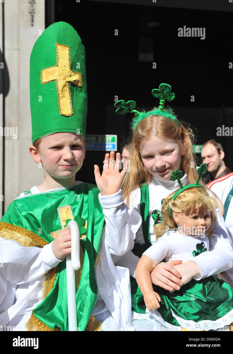 Piccadilly, London, UK. 16th March 2014.  A young boy dressed as St Patrick at the St Patrick's Day Parade in London. Credit:  Matthew Chattle/Alamy Live News Stock Photo