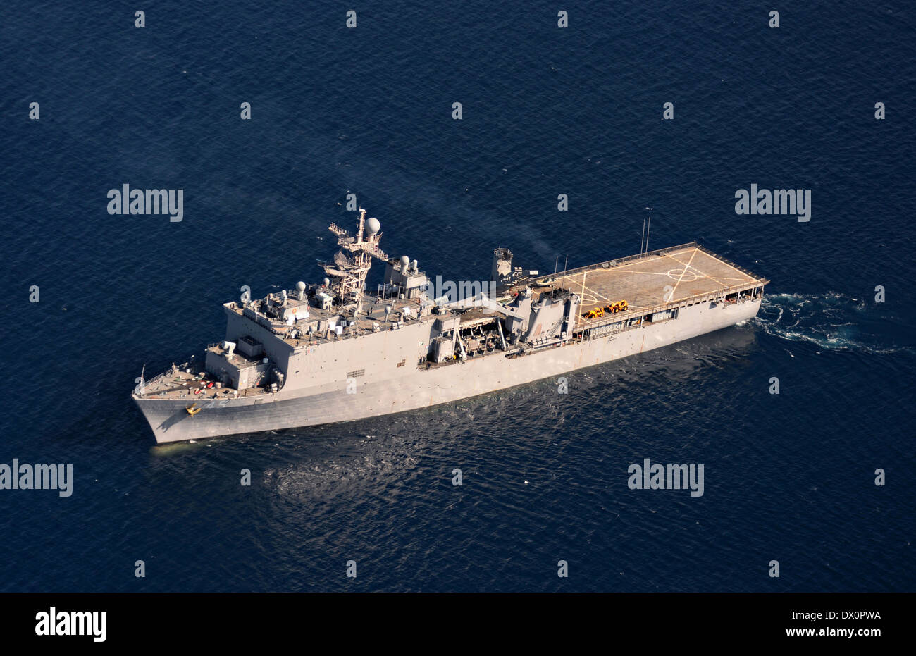 US Navy dock landing ship USS Comstock conducting sea qualifications in preparation for its upcoming scheduled deployment March 13, 2014 in the Pacific Ocean. Stock Photo