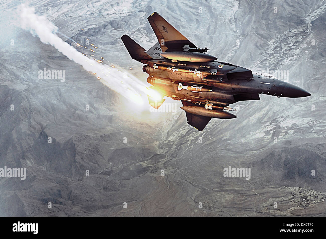 A US Air Force F-15E Strike Eagle from the 391st Expeditionary Fighter Squadron Bagram Air Base deploys heat decoys during a combat patrol December 15, 2008 over Helmand province, Afghanistan. Stock Photo