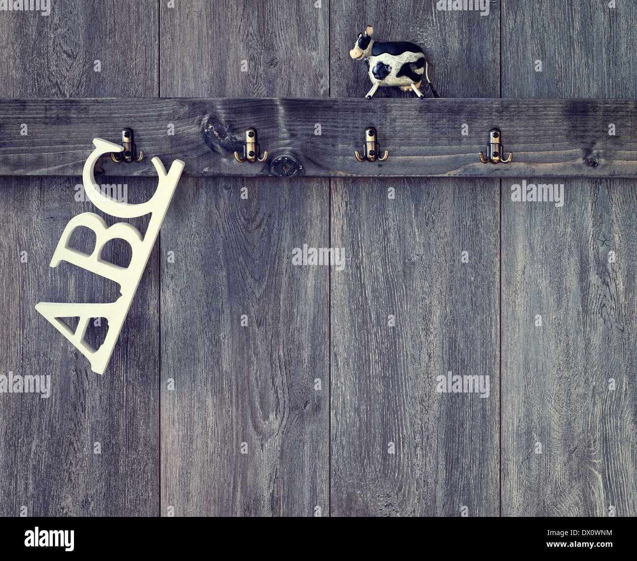 Abc Letters Hanging On Nursery Wall With Toy Cow Stock Photo Alamy
