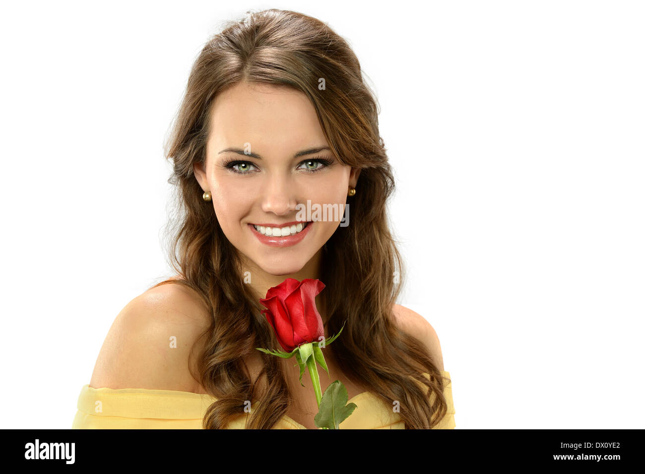 Beautiful young woman holding rose isolated over white background Stock ...
