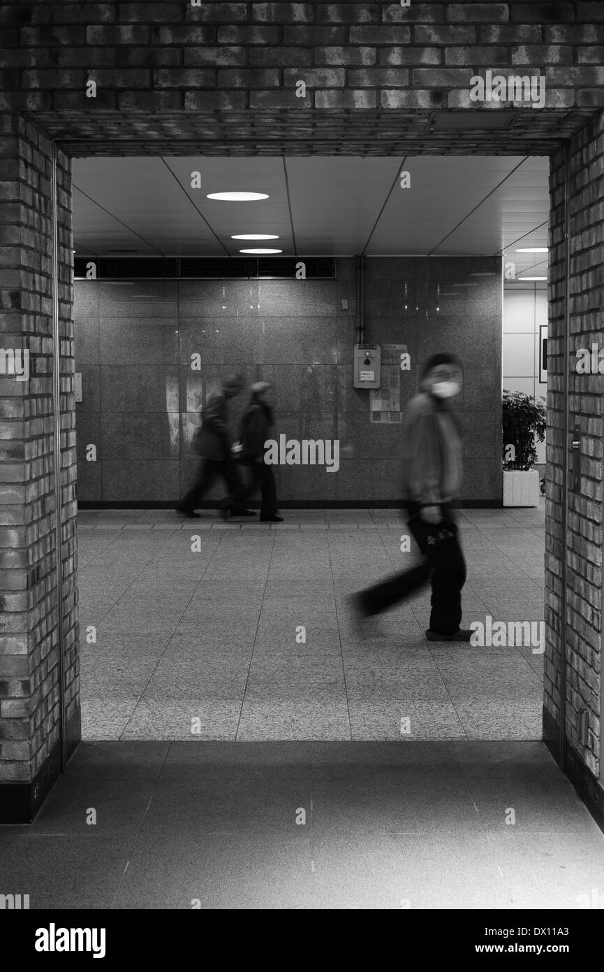 Man walking Underground Shinjuku, Tokyo, Japan Stock Photo