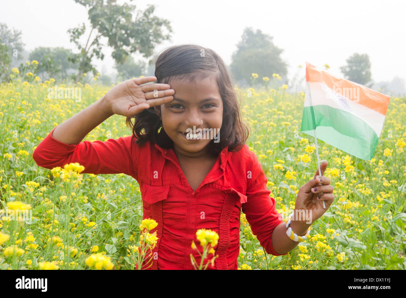 1 Indian Kids Standing with Flag Stock Photo