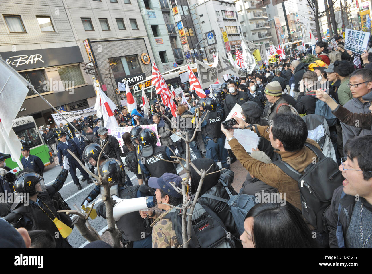 Tokyo, Japan. 16th Mar, 2014. Anti-racist Japanese clashed with members ...